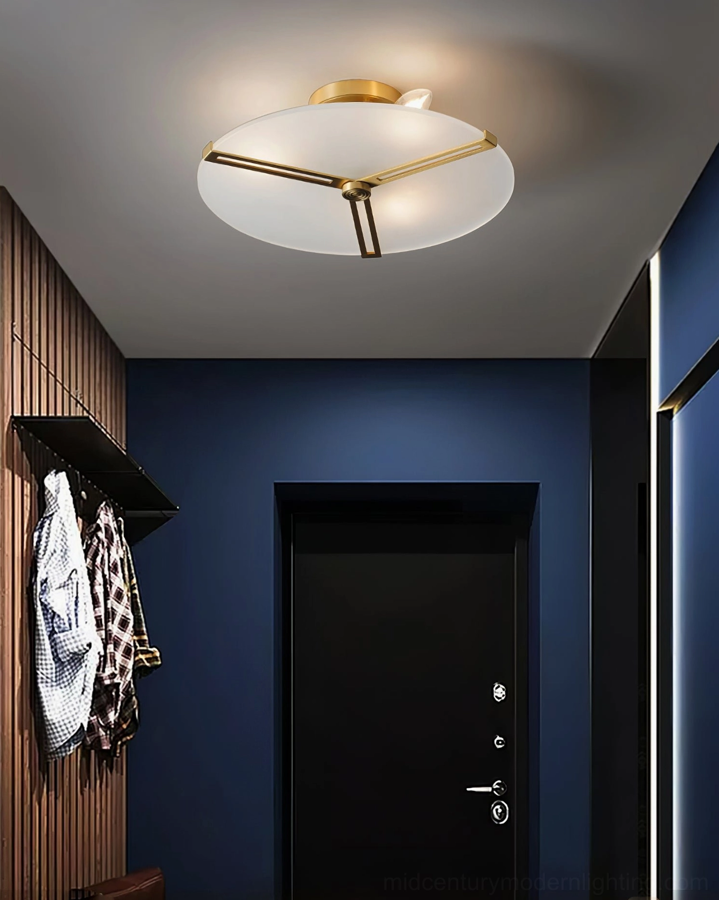 Frosted glass disc ceiling lamp with brass triangular frame architectural detail