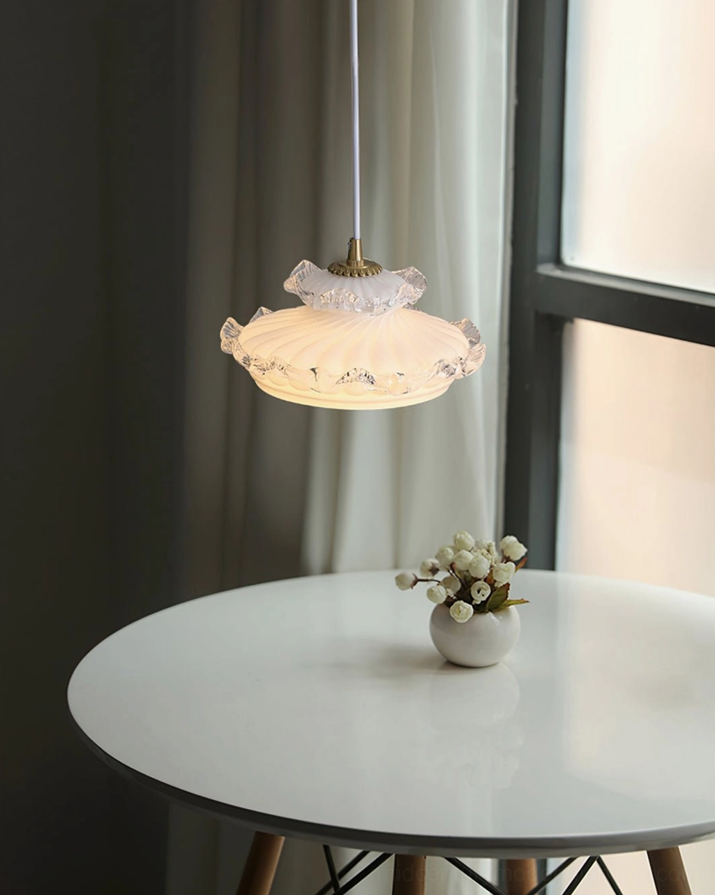 Frosted milk glass pendant light fixture shown in architectural interior setting