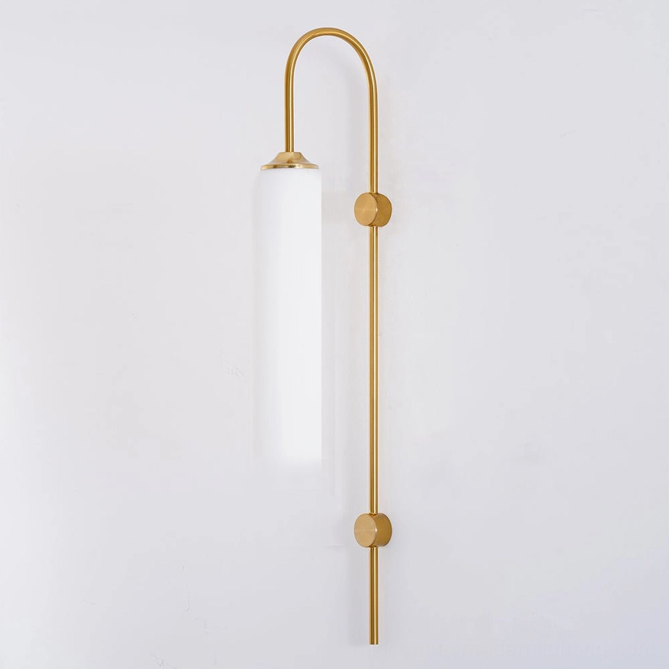 Frosted white glass cylindrical wall sconce with long vertical metal mounting rod and dual gold accents
