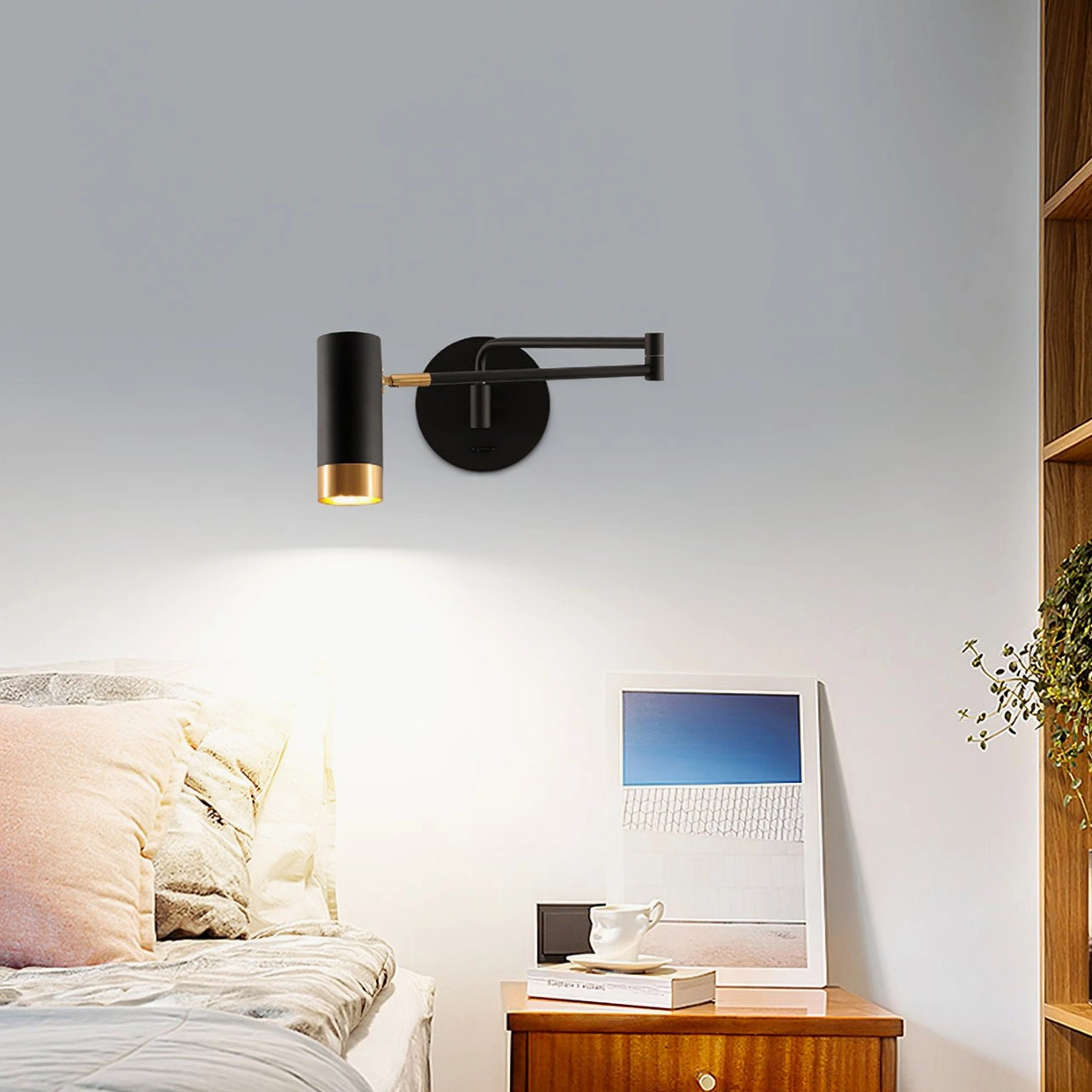 Fumi articulating wall sconce mounted in modern mid-century room design scheme