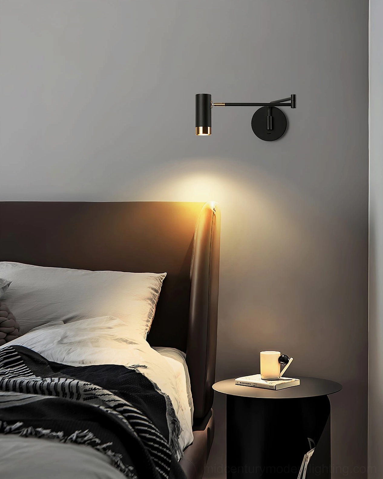 Fumi white and gold swing wall sconce with folding adjustable arm mechanism close-up