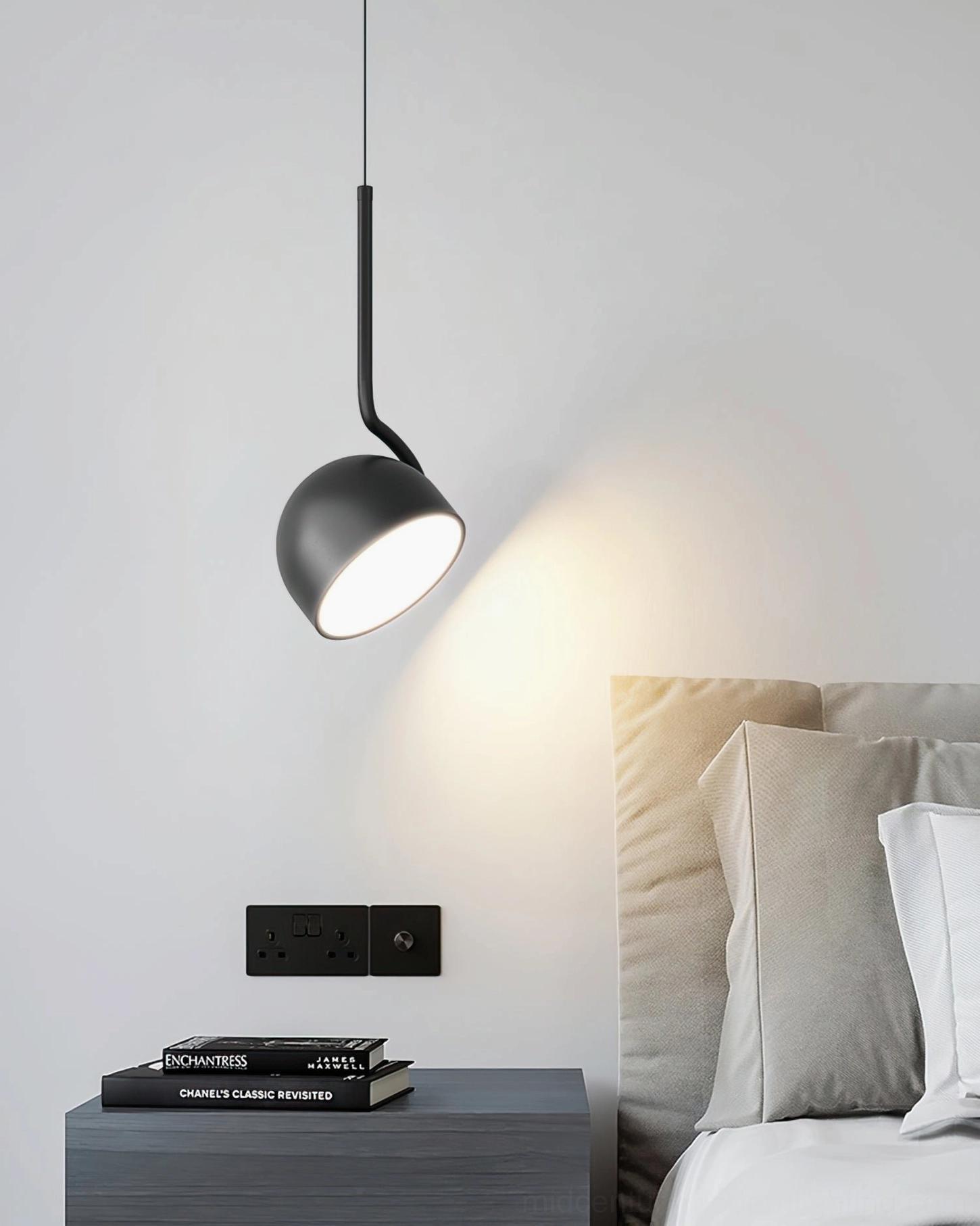 Furoku black contemporary pendant lamp creating ambient lighting in modern bedroom decor