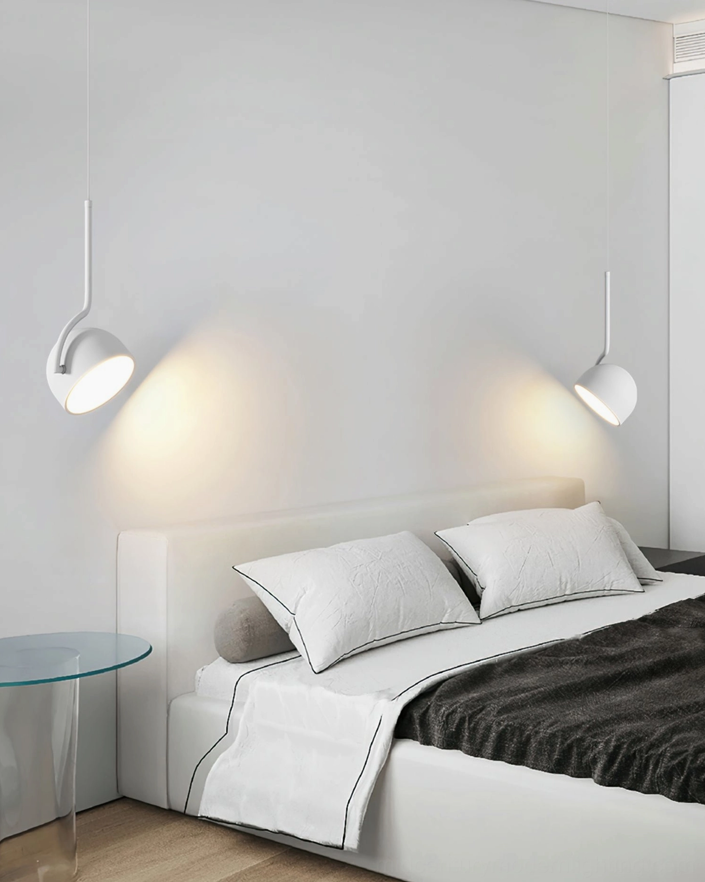 Dual Furoku white pendant lights in modern master bedroom, paired Scandinavian ceiling fixtures
