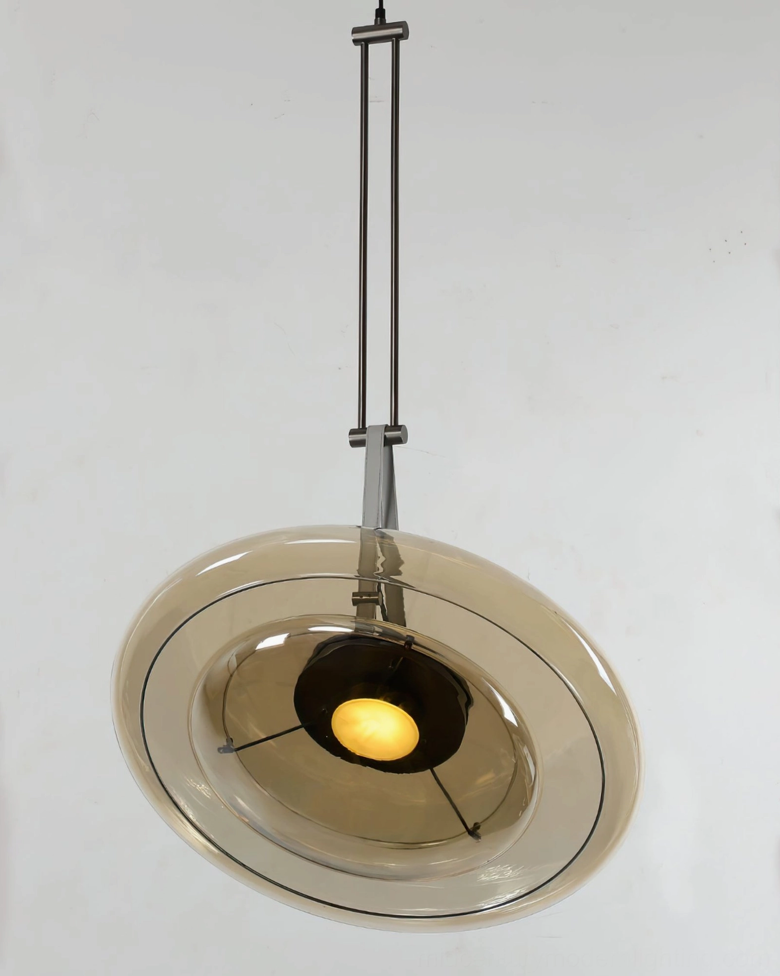 Futura contemporary pendant lamp with sculptural glass dome in elegant interior lighting application