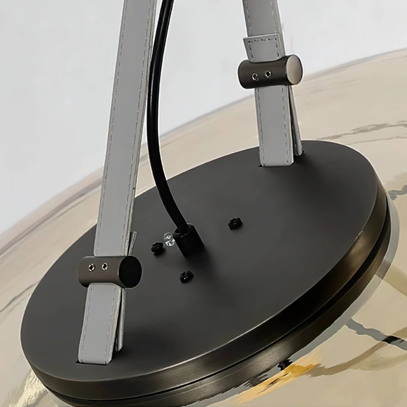 Futura glass and leather pendant light detail showing premium materials and minimalist craftsmanship