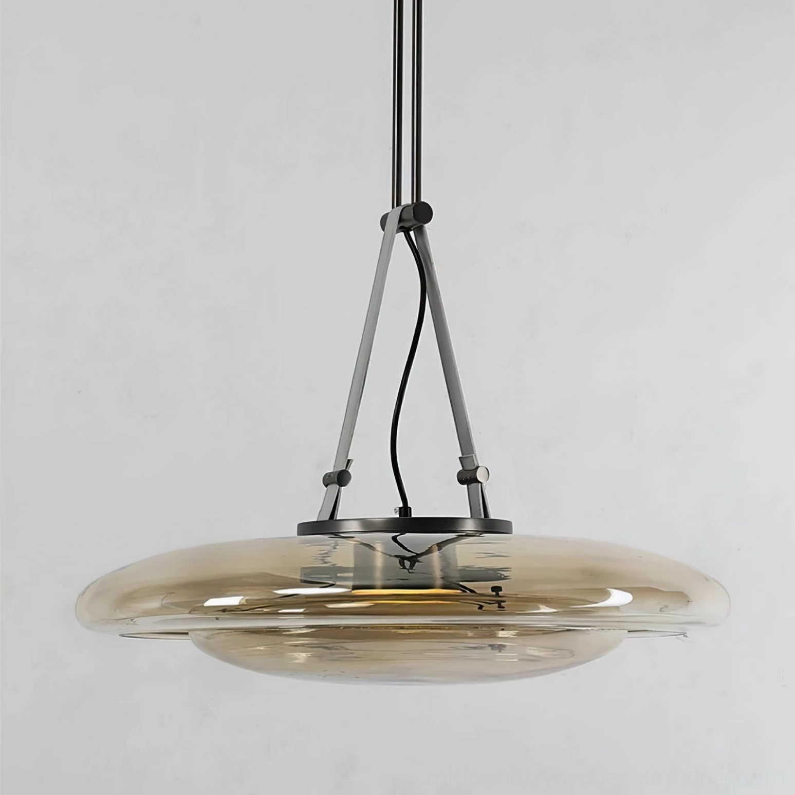 Futura pendant lamp with black triangular metal hanging bracket and suspension hardware detail