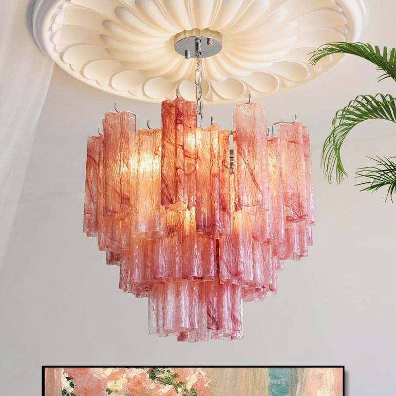 Gabriella tiered glass chandelier with deep pink marbled finish in vintage-inspired interior with green plants