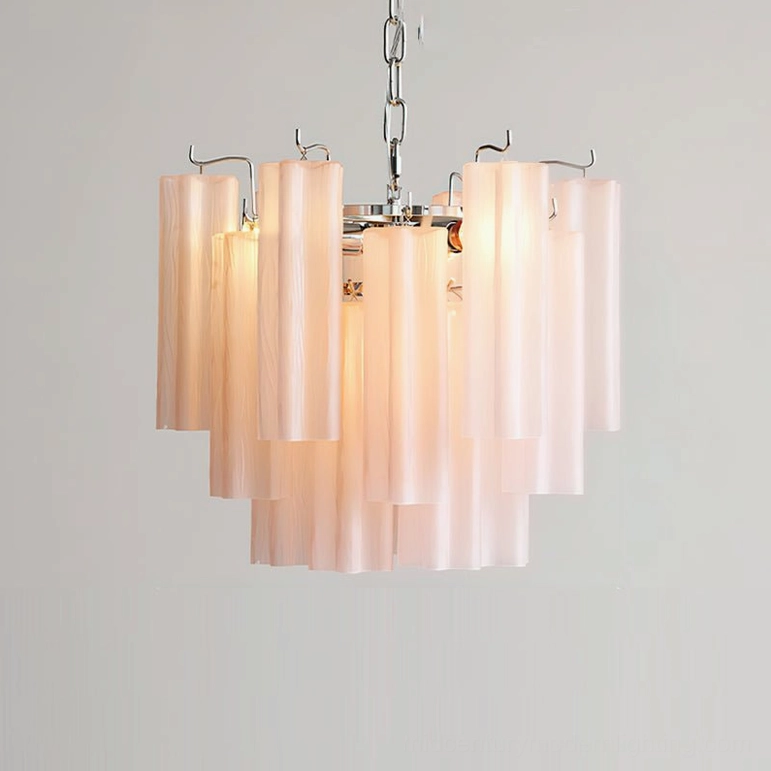 Gabriella tiered glass chandelier in elegant dining room creating warm ambient lighting for entertaining