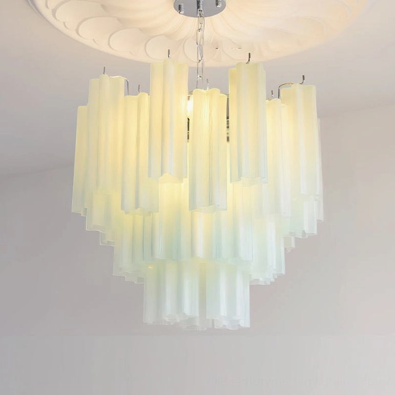 Gabriella tiered glass chandelier green variant in contemporary home with wellness-focused interior design