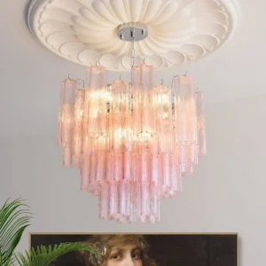 Gabriella pink tiered glass chandelier installed in elegant living room with ceiling medallion and botanical décor