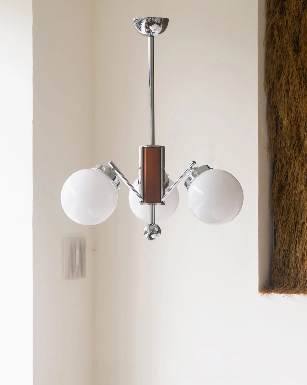 Gaetano sputnik chandelier showcasing mid-century modern design elements, walnut and chrome construction detail