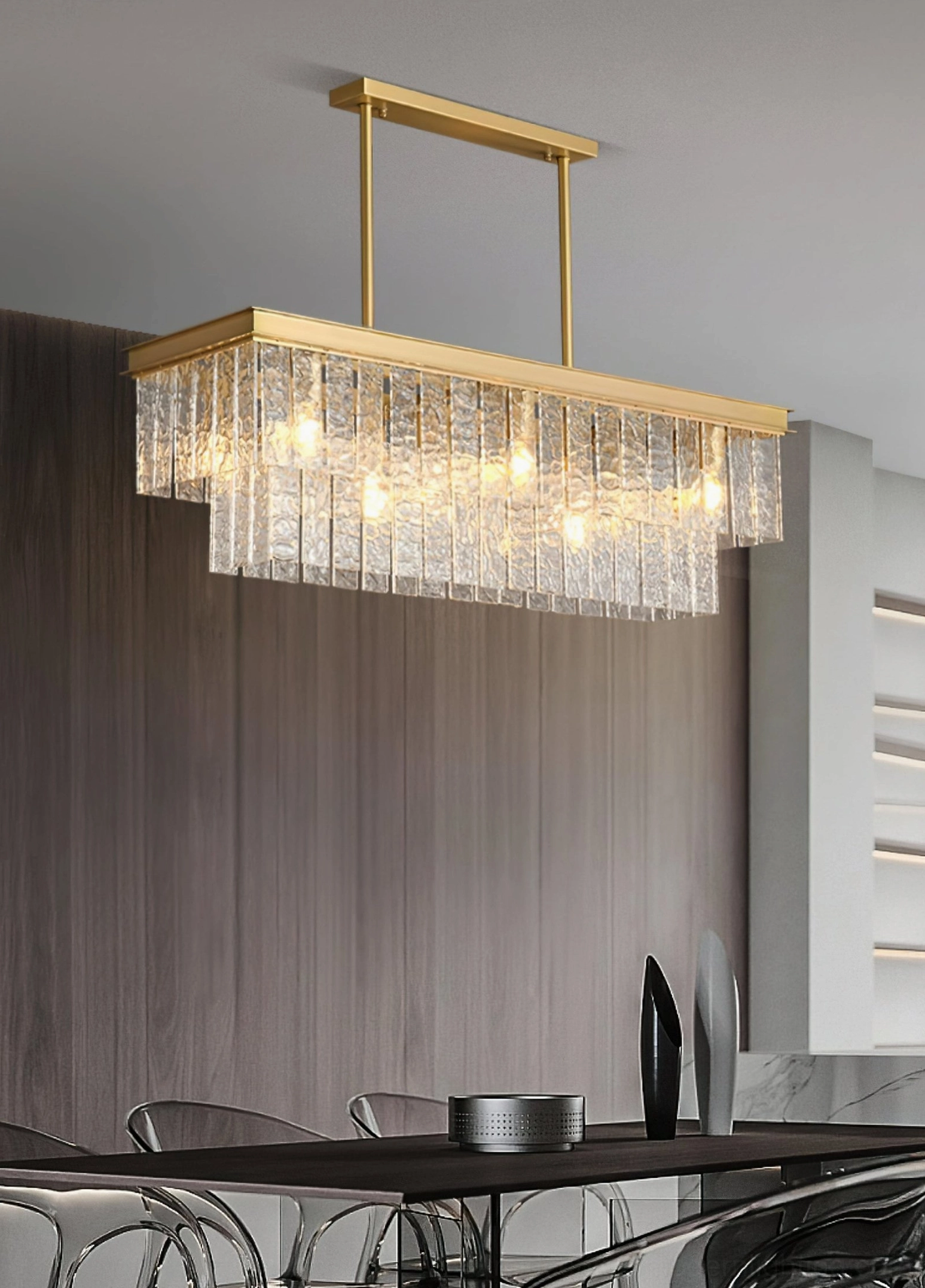 Gaia tiered chandelier installed above dining table in modern dark wood dining room interior