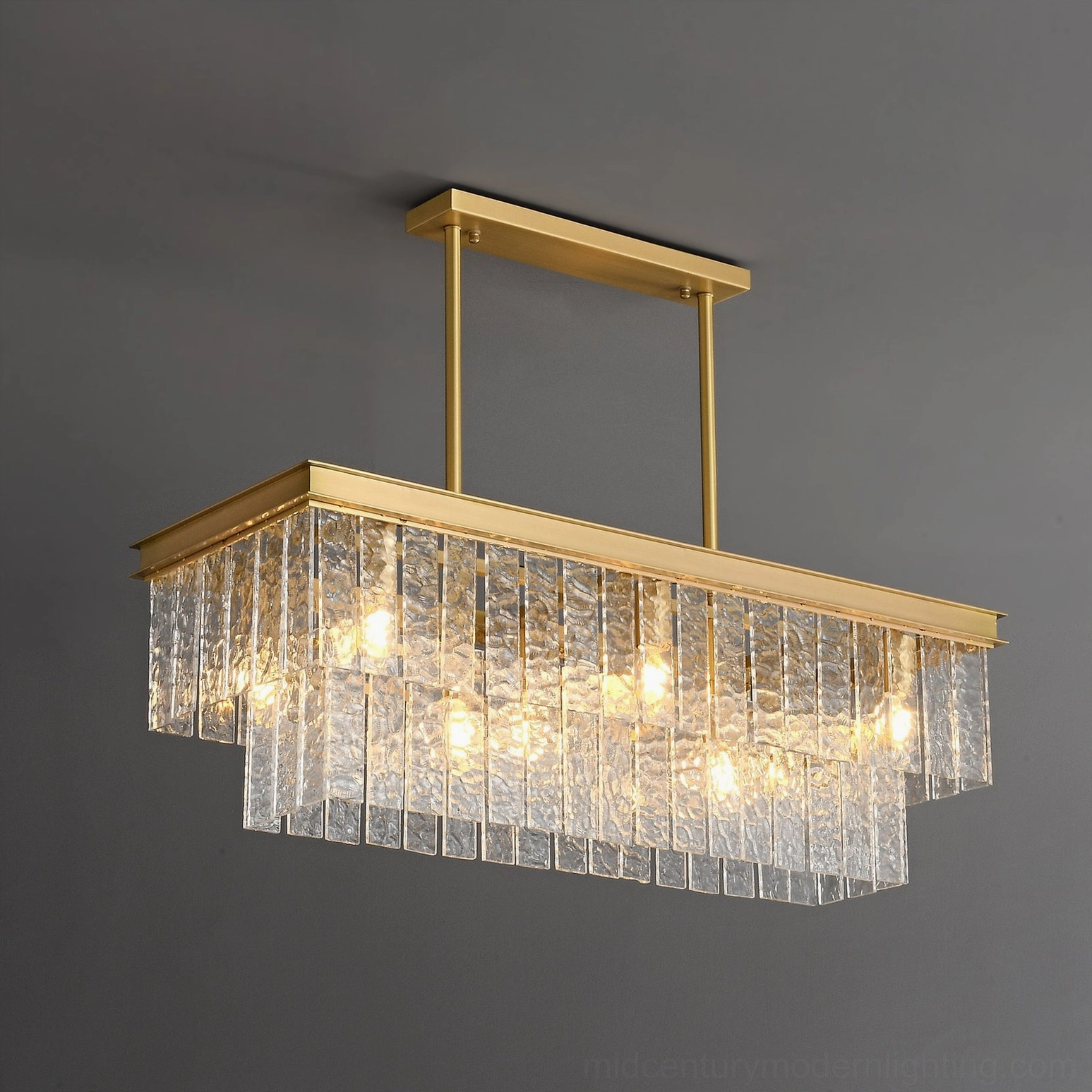 Gaia glass pendant chandelier three-quarter side angle, showcasing layered tiered design and warm ambient lighting