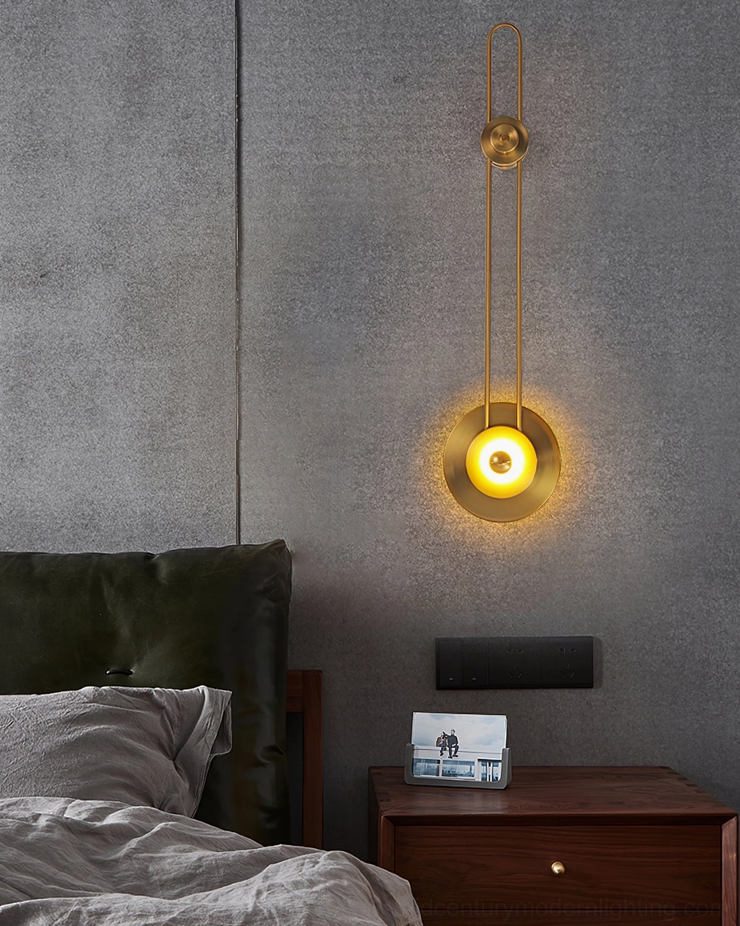 Gaia long wall sconce brass gold rod with warm round ambient light fixture