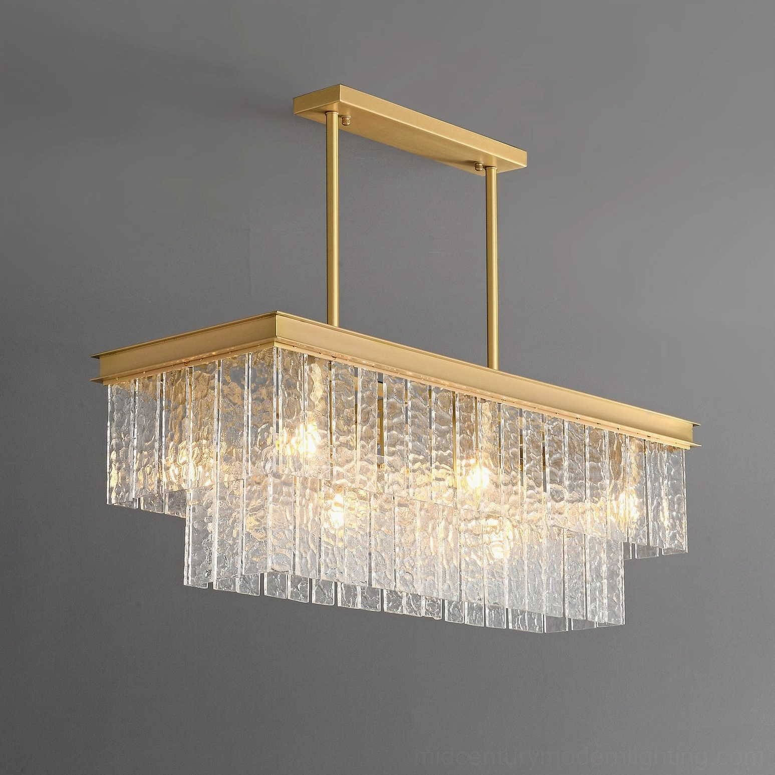 Gaia tiered chandelier showcase image highlighting elegant two-tier cascading glass and brass construction