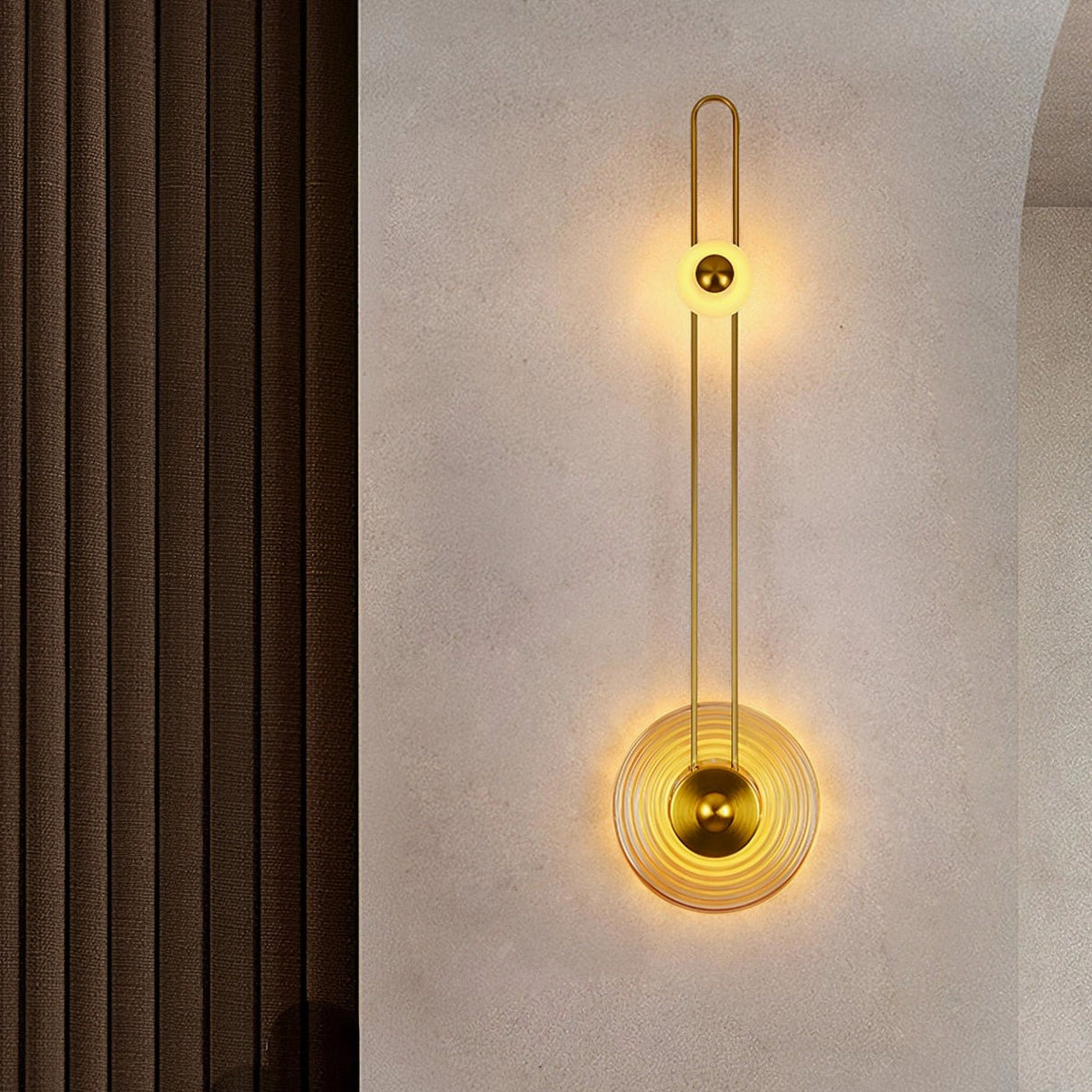 Gaia wall sconce installed in residential hallway with warm ambient lighting