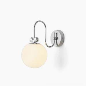 Galaxy Lux modern wall sconce with sculptural chrome S-shaped arm and frosted glass globe, front three-quarter view on white background