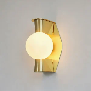 Gale Globe Wall Sconce unlit frosted white glass sphere with curved brass gold mounting bracket, frontal profile