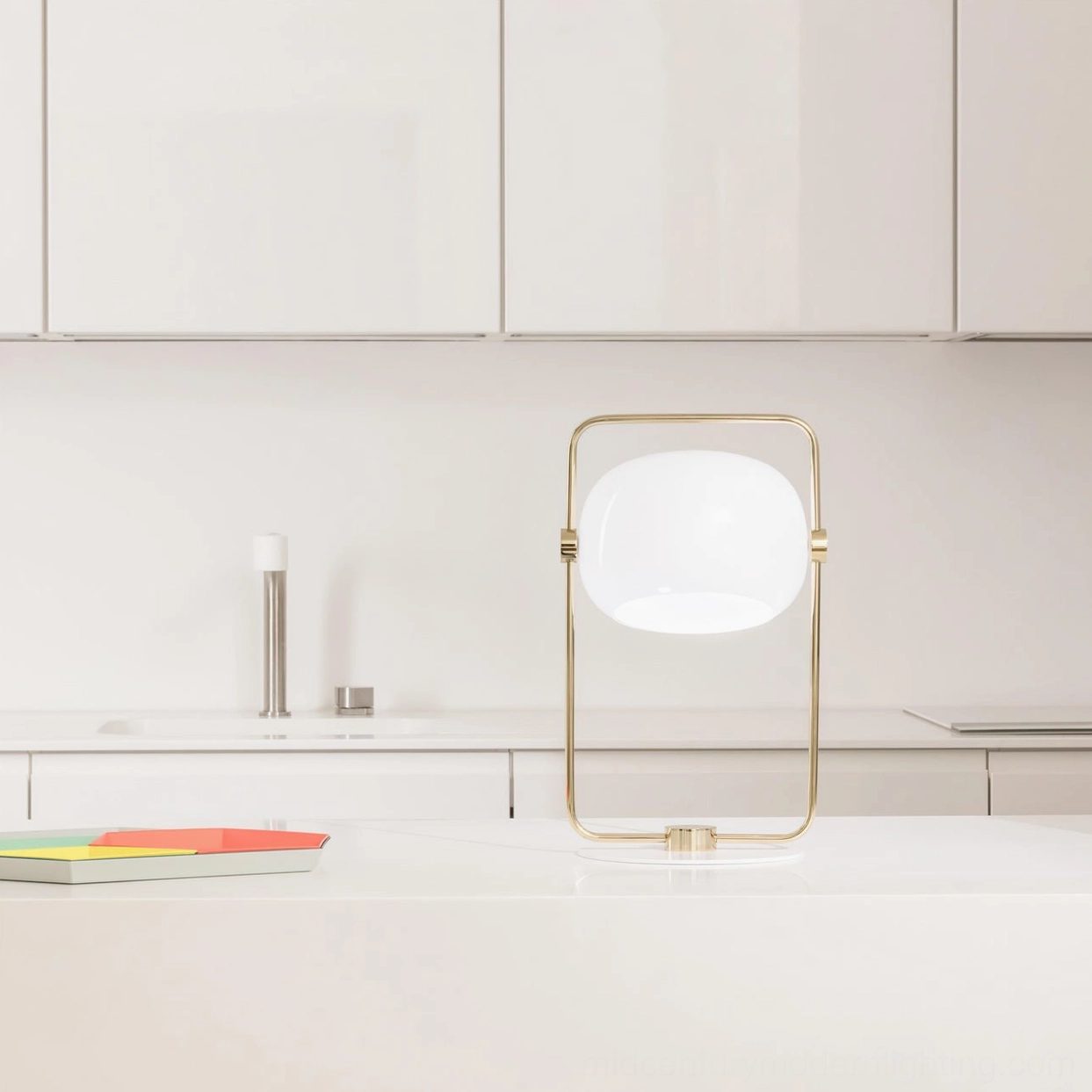 Brass gold geometric table lamp in modern kitchen countertop white minimalist setting