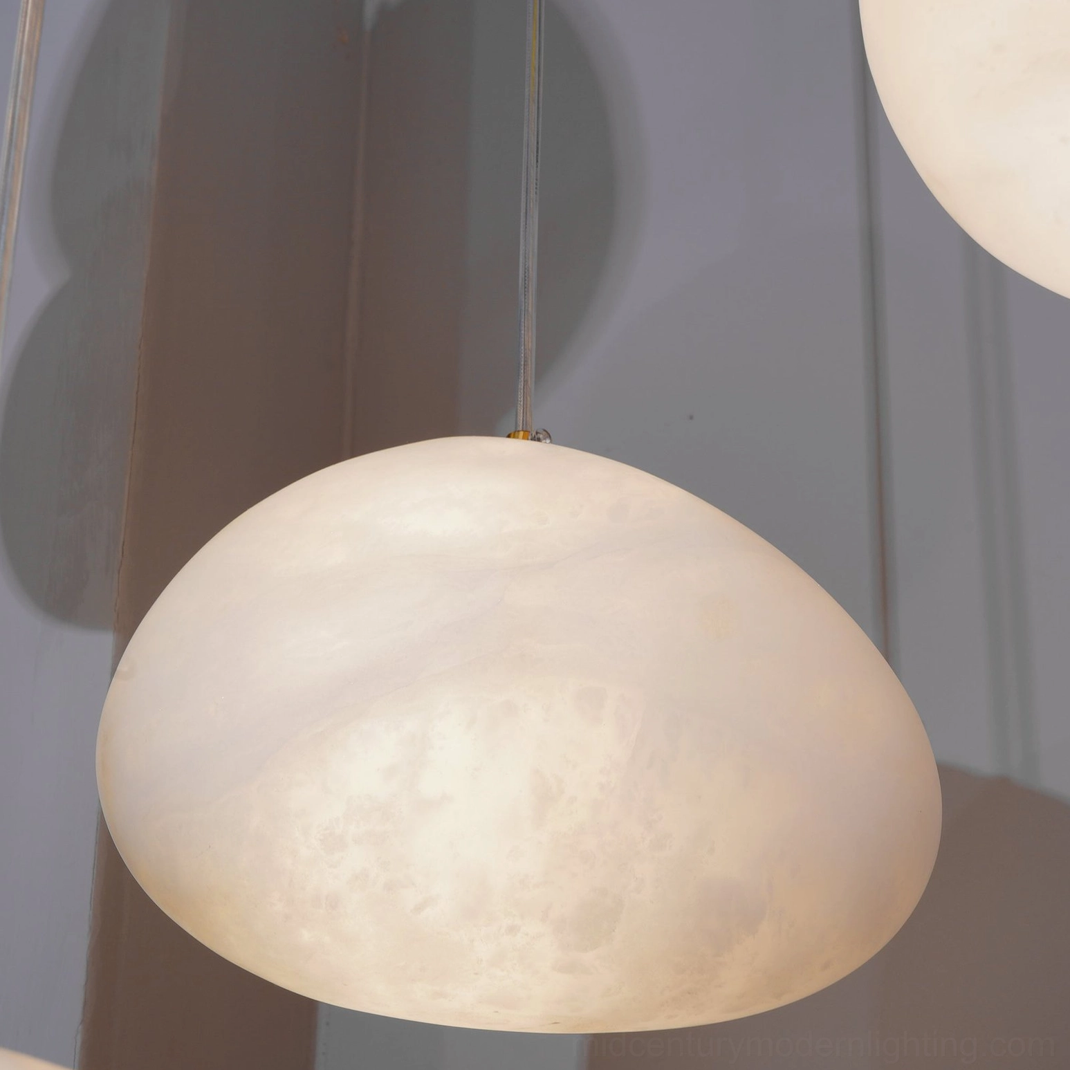 Galet Model E compact alabaster pendant intimate space fixture
