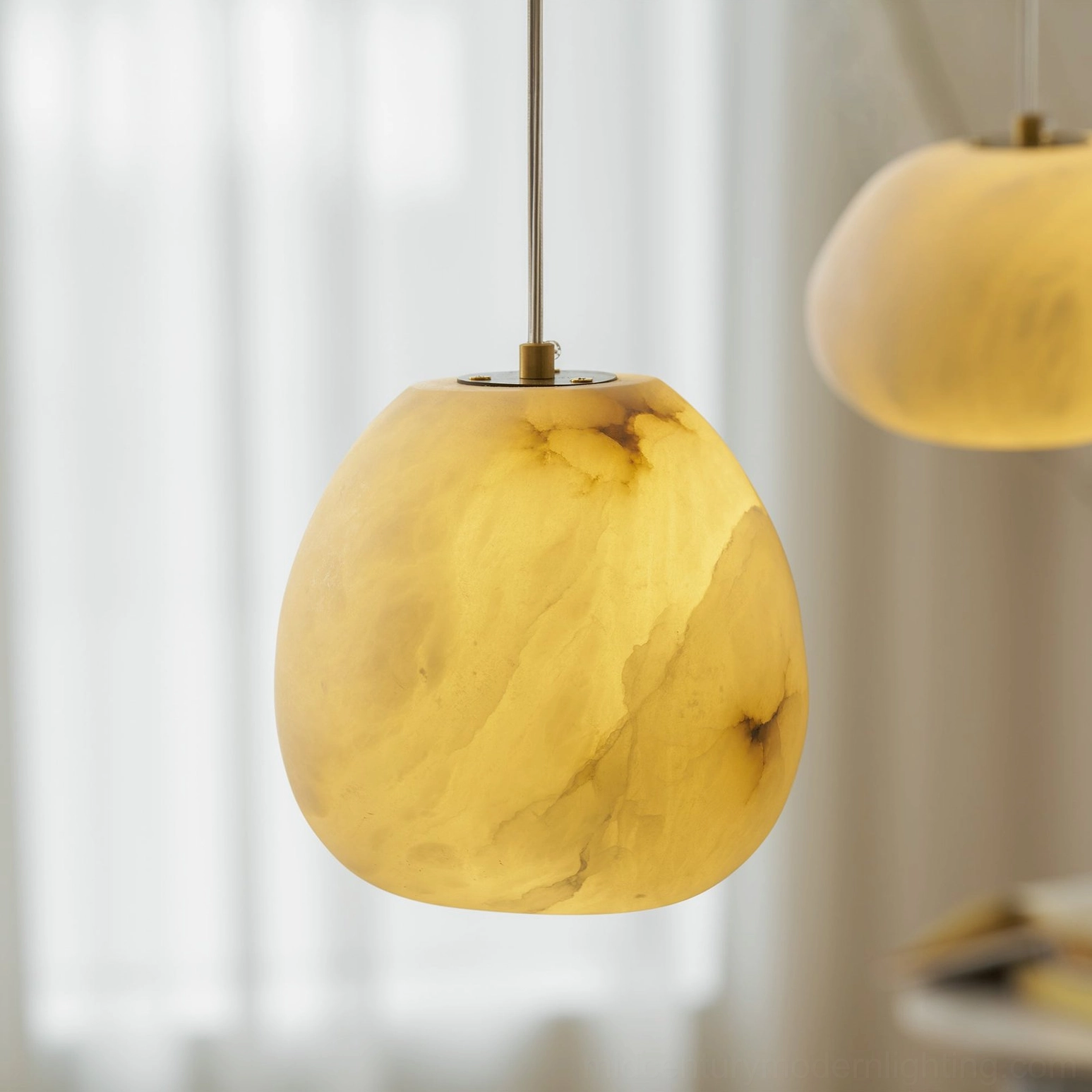 Galet alabaster pendant curved organic form sculptural design