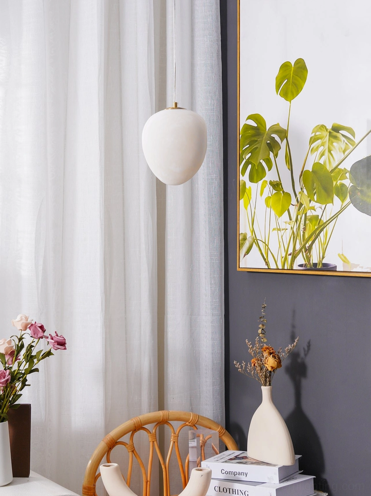Galet alabaster pendant illuminated from within revealing warm luminescence