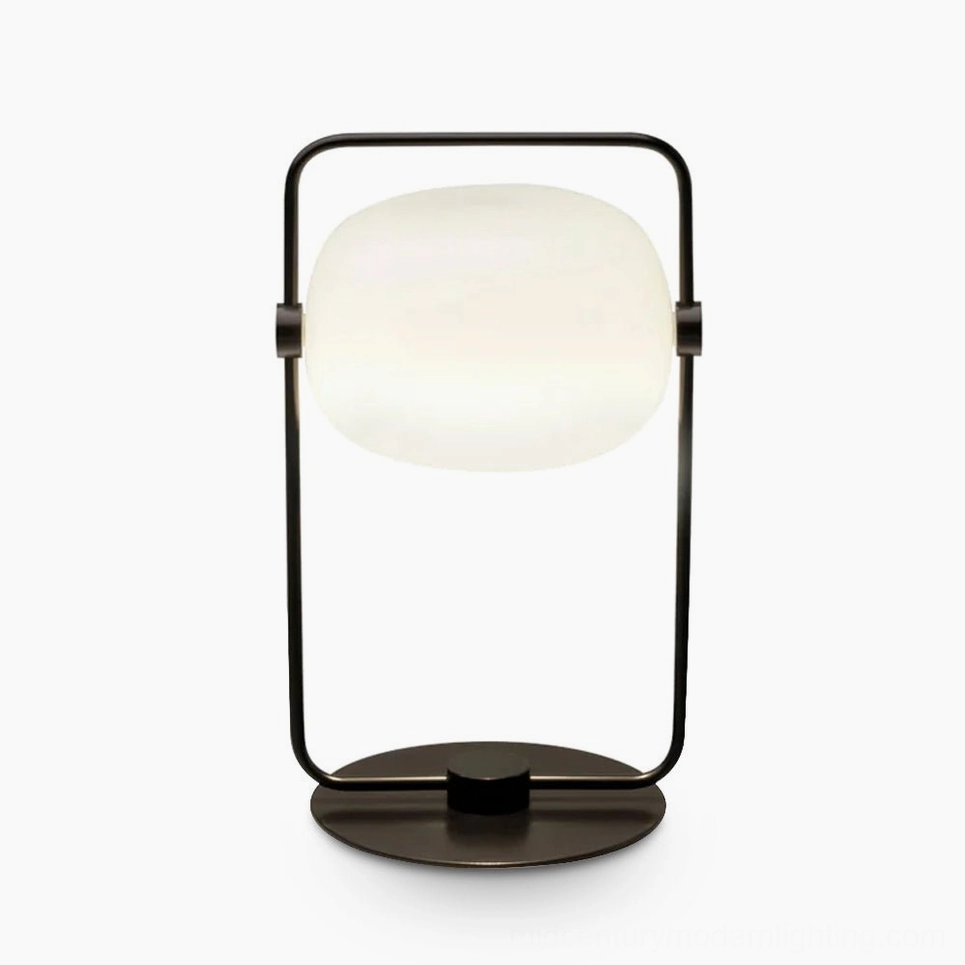 Minimalist table lamp available in black and gold finishes for modern interiors