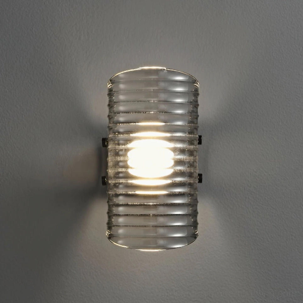 Cylindrical ribbed glass Gatsby wall lamp in clear glass variant, minimalist modern lighting fixture frontal view