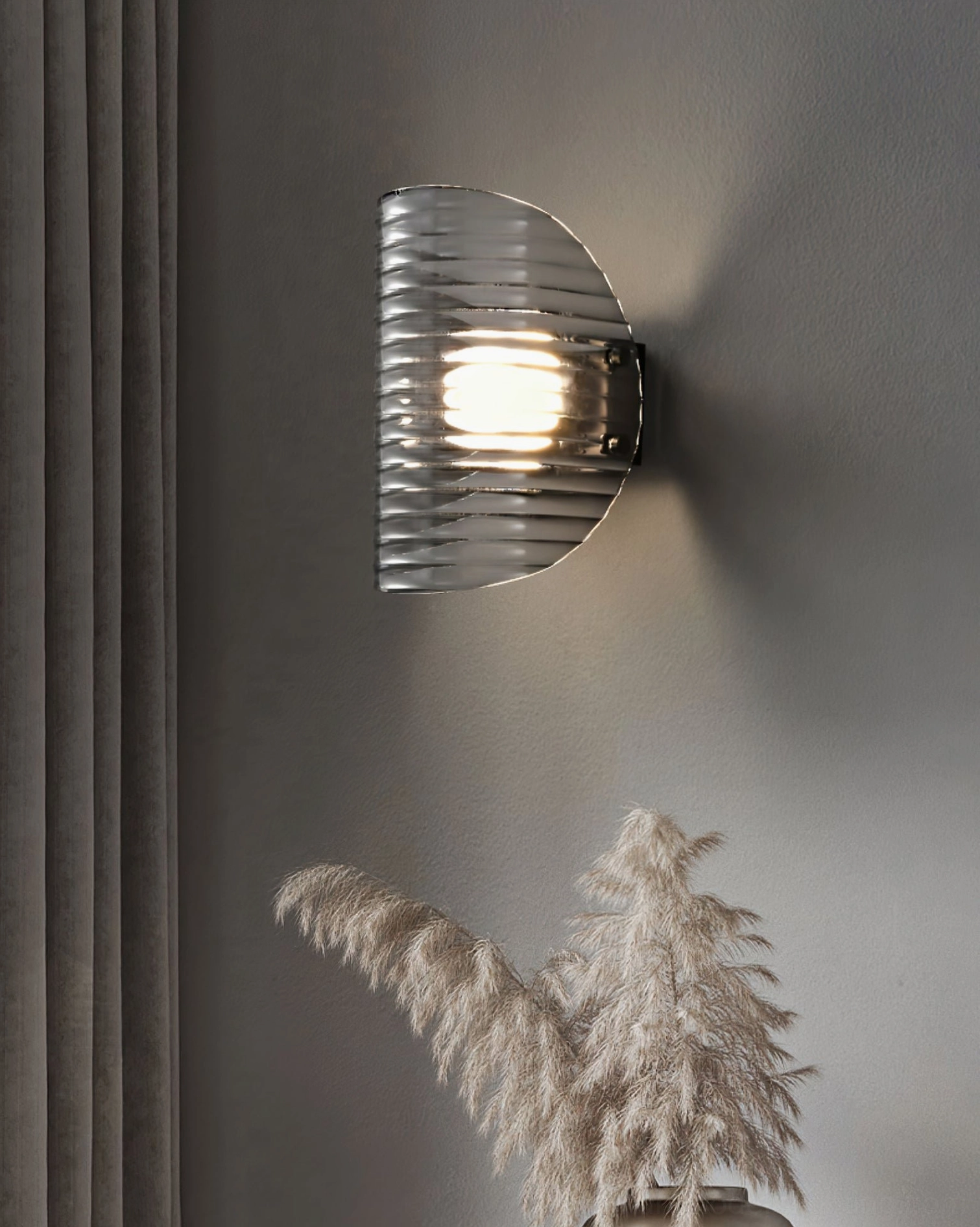 Gatsby wall lamp mounted in contemporary living room with curtains and pampas grass decor, neutral modern home interior styling