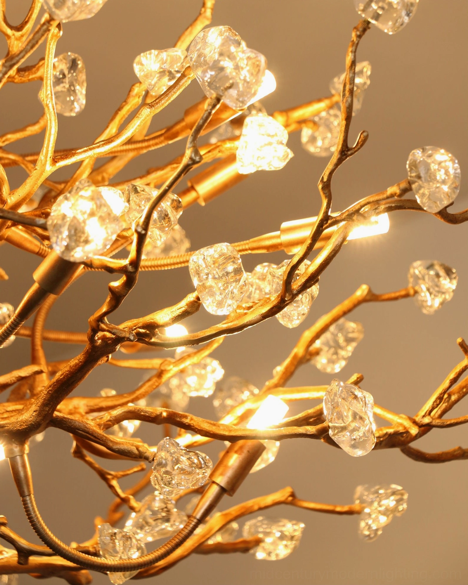 Gemstone branch chandelier studio lighting shot showing brass patina and crystal clarity