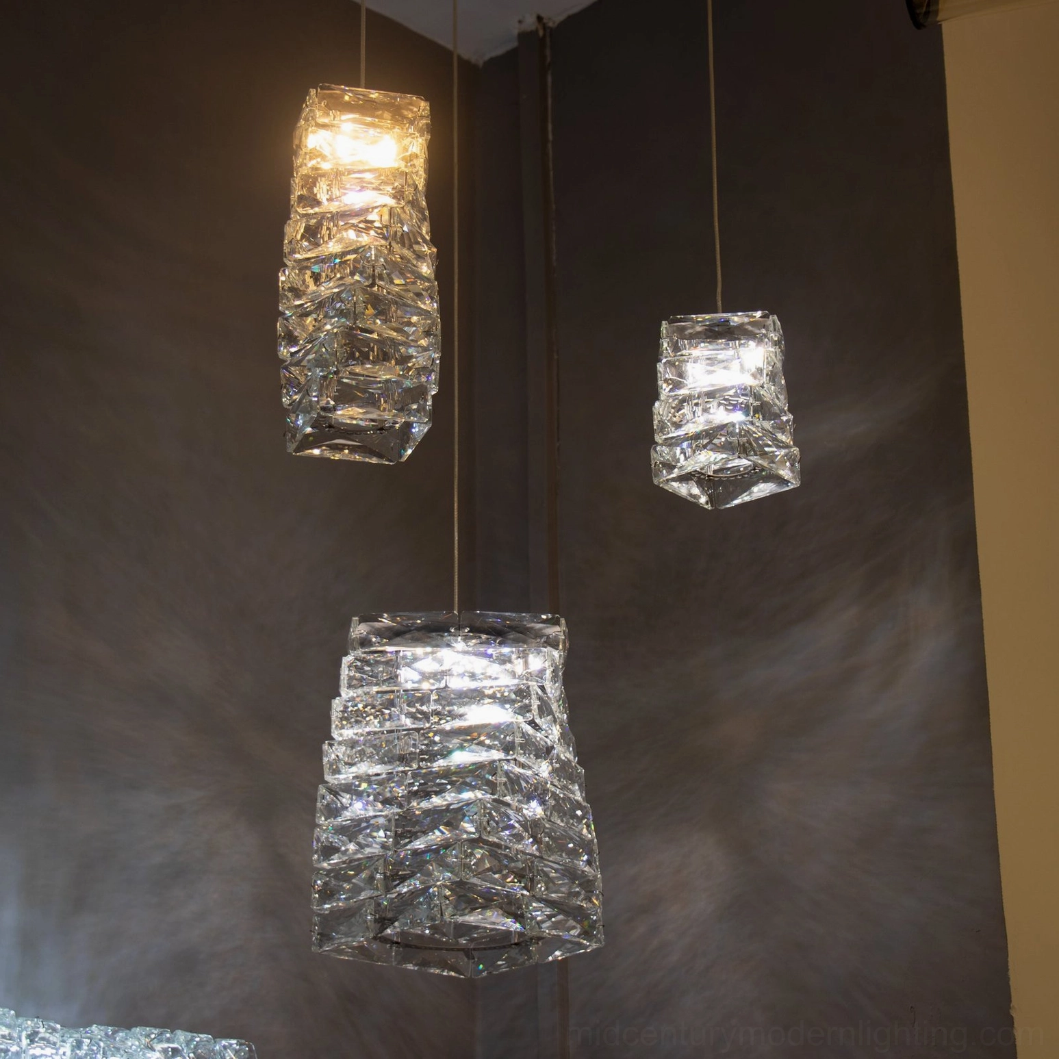 Faceted crystal pendant lamp showing geometric crystal shade construction and integrated LED illumination