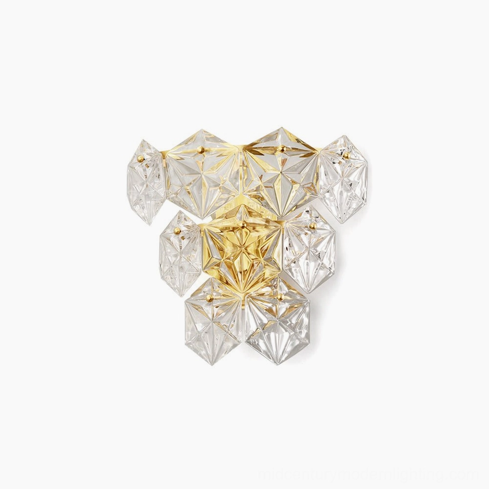 Geometric faceted crystal wall sconce with polished gold brass frame and clear glass - modern luxury lighting