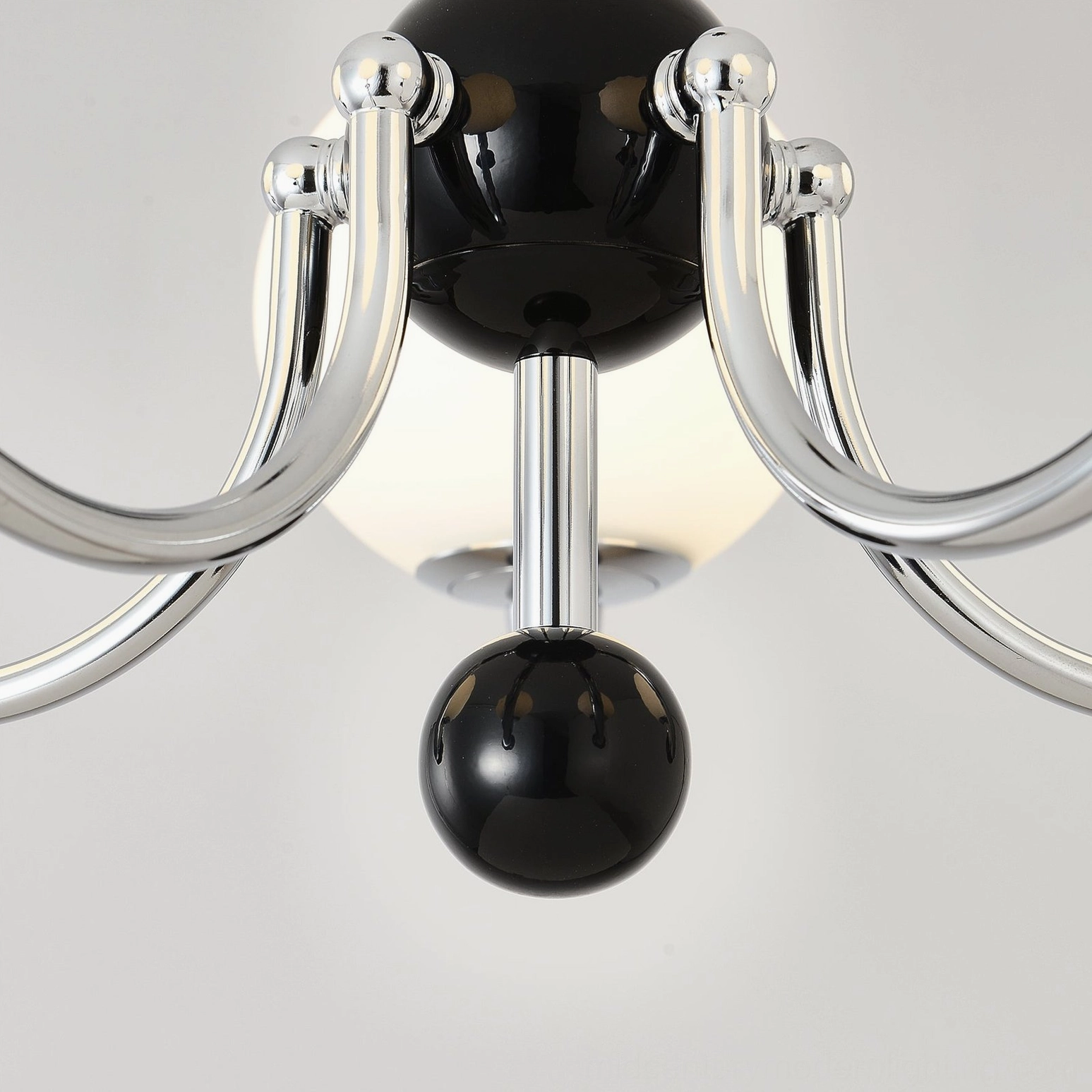 Geometric spherical chandelier showcasing mid-century modern design principles