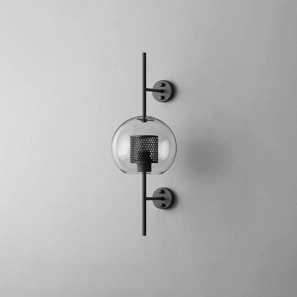 Contemporary glass wall sconce with geometric proportions and refined finish
