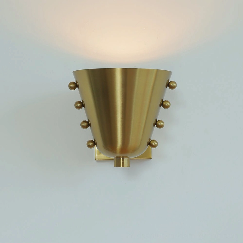 Contemporary geometric wall sconce beauty shot highlighting design details and finish