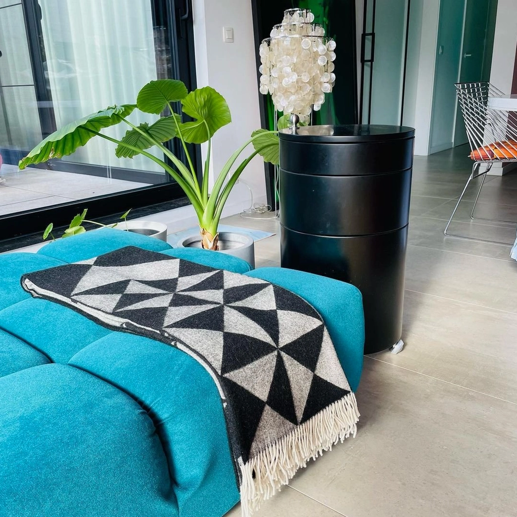 Geometric tiered shell floor lamp design with stainless steel framework