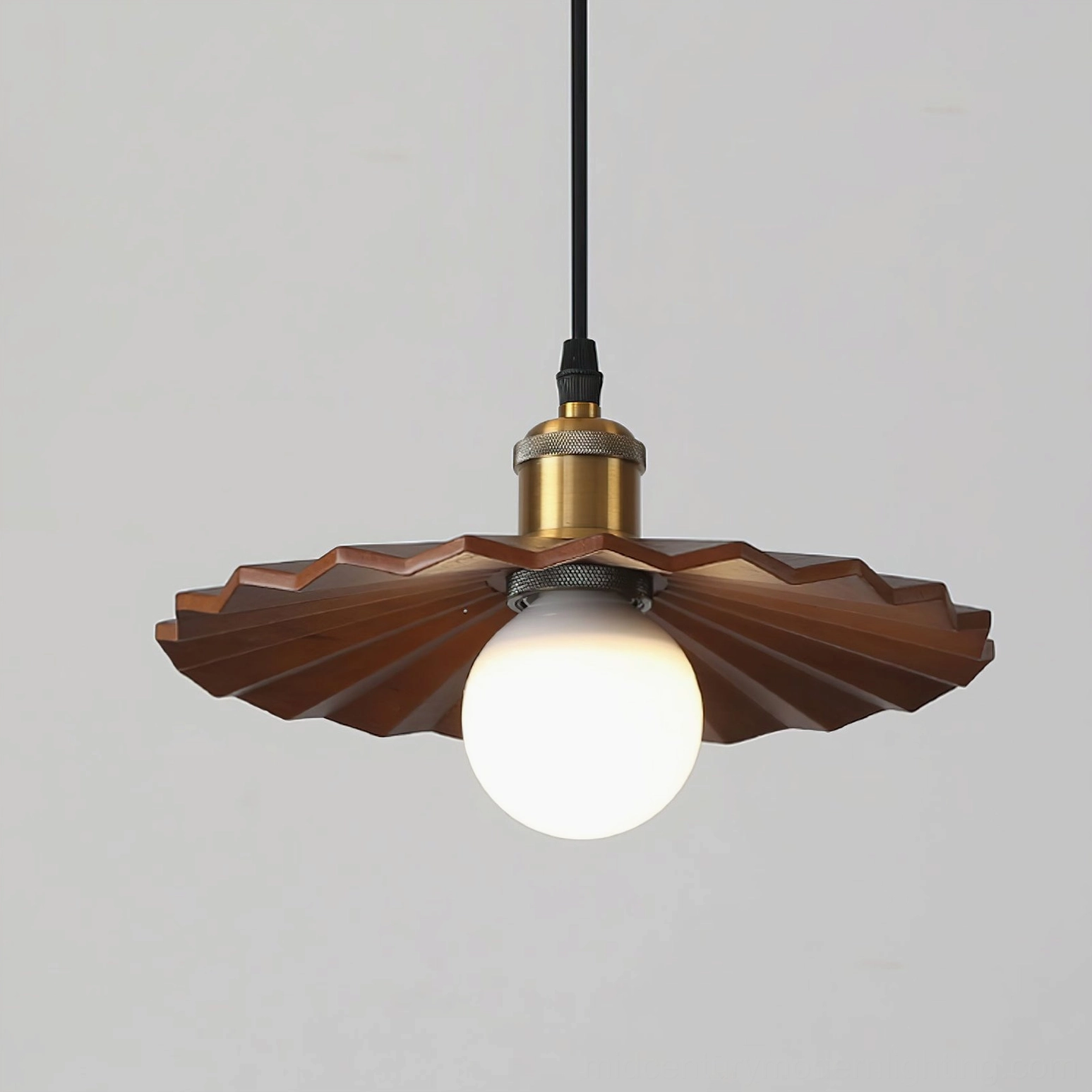 Geometric wooden pendant light collection showing different sizes and finishes - walnut and natural wood options