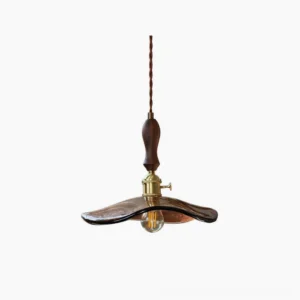 Gideon wavy glass pendant light with amber-brown blown glass shade, walnut wood finial, and vintage brass socket displayed against neutral background