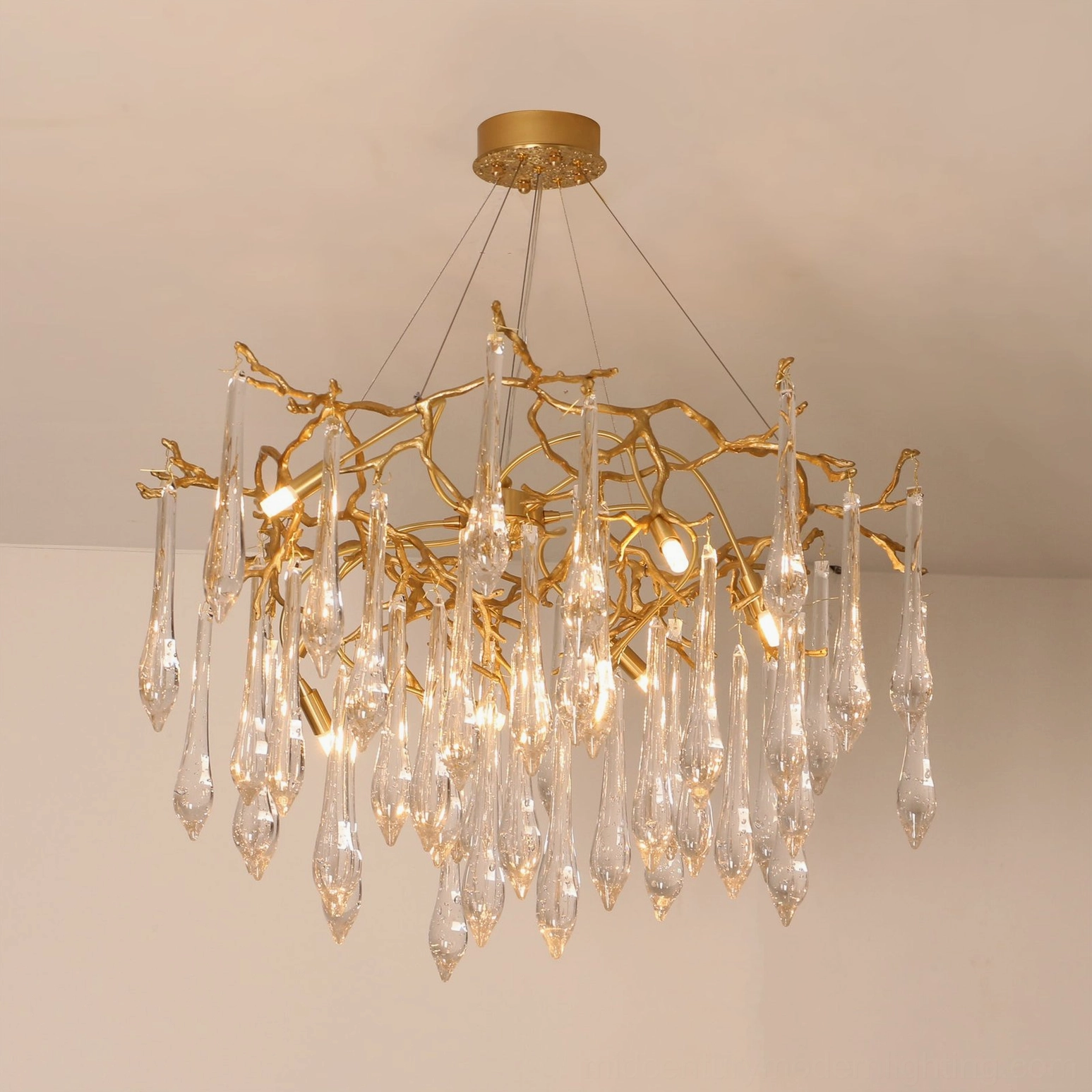 Gieslinde Branch Chandelier displaying intricate brass branch framework and crystal details