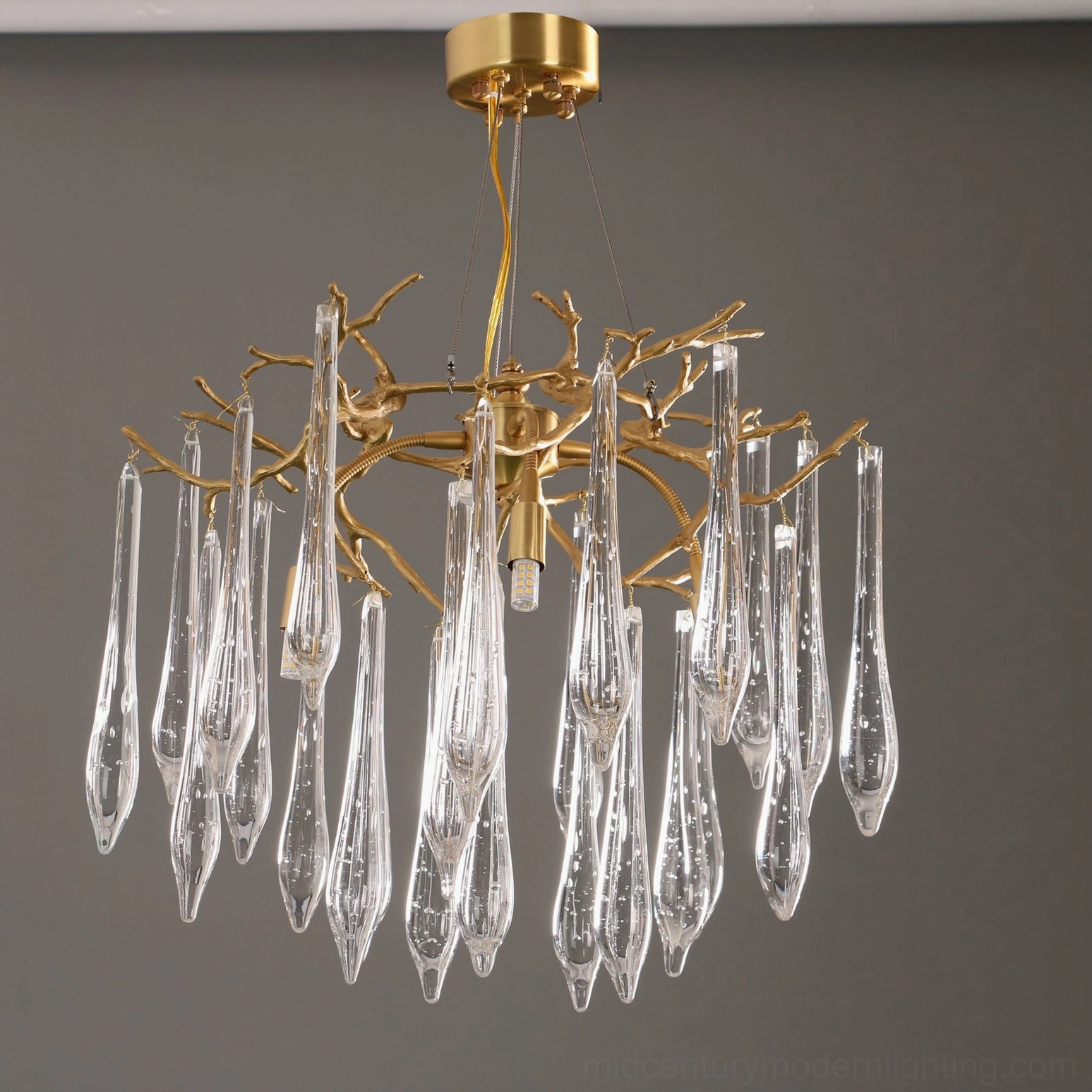 Gieslinde Branch Chandelier unlit showcasing brass frame and sparse crystal pendant arrangement