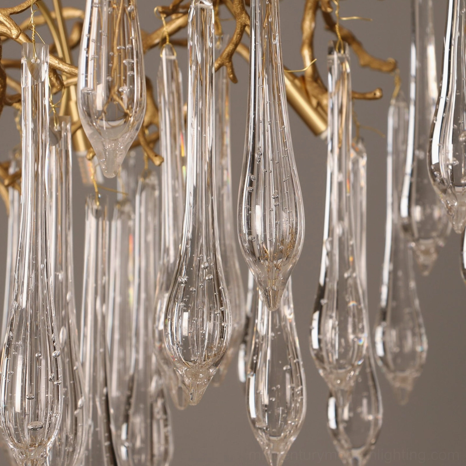 Detailed view of clear water-drop crystal pendants on Gieslinde Branch Chandelier