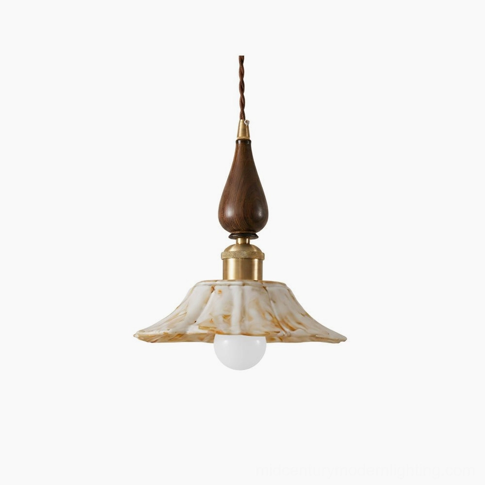 Gigaro ceramic pendant light with ruffled marbled shade, wood top, and brass hardware on white background