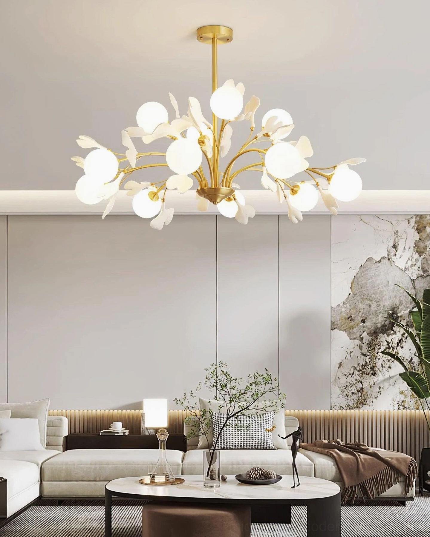 Gingko chandelier brass branch sculptural form and botanical silhouette