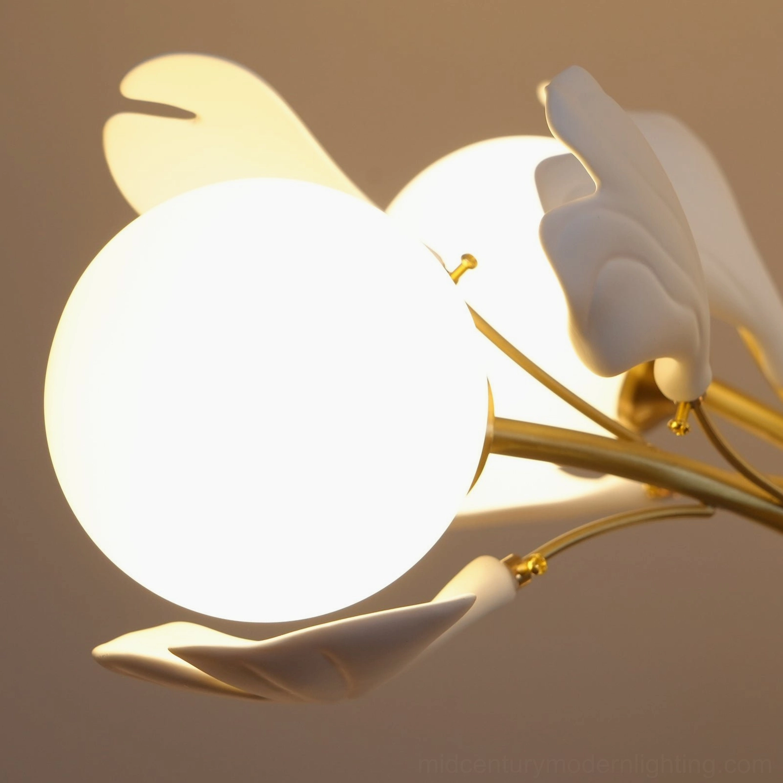 Gingko chandelier hand-finished brass patina detail and construction quality