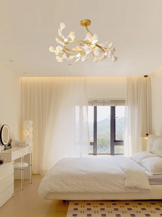 Ginkgo ceiling lamp installed in modern minimalist bedroom with warm cozy lighting