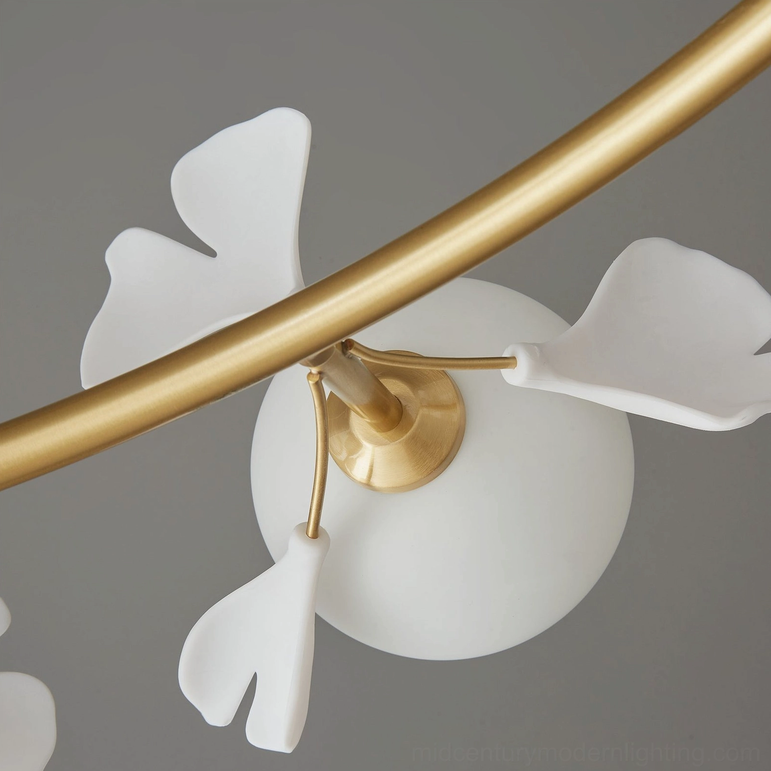 Brass ginkgo chandelier crown detail frosted glass orbs