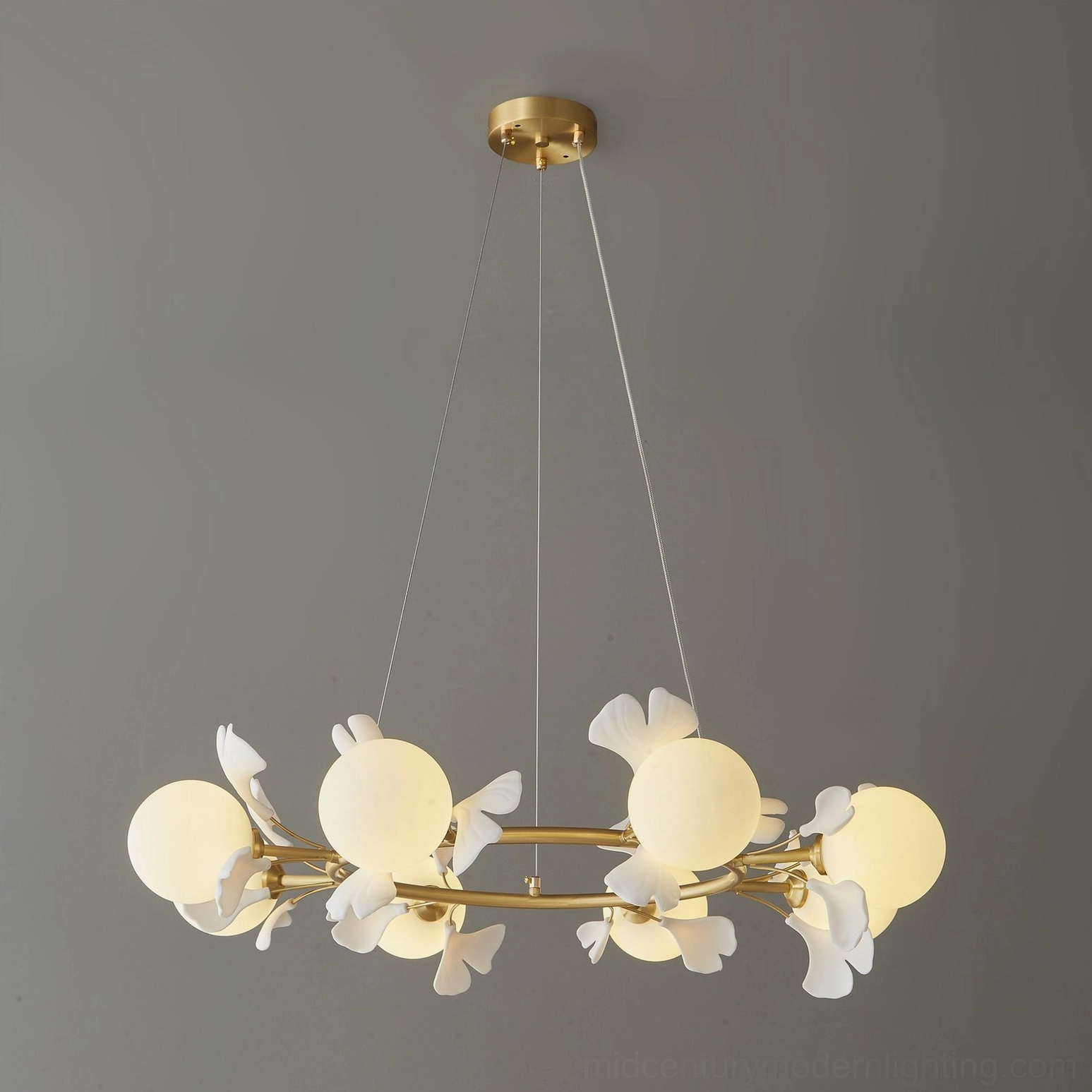 Brass ginkgo chandelier light diffusion frosted glass aesthetic