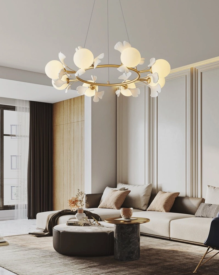 Brass ginkgo pendant light in upscale modern home with sectional sofa