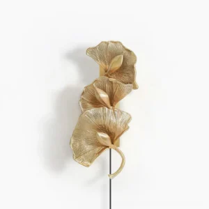Ginkgo leaf brass wall lamp with sculptural fan-shaped design in golden finish, front studio view