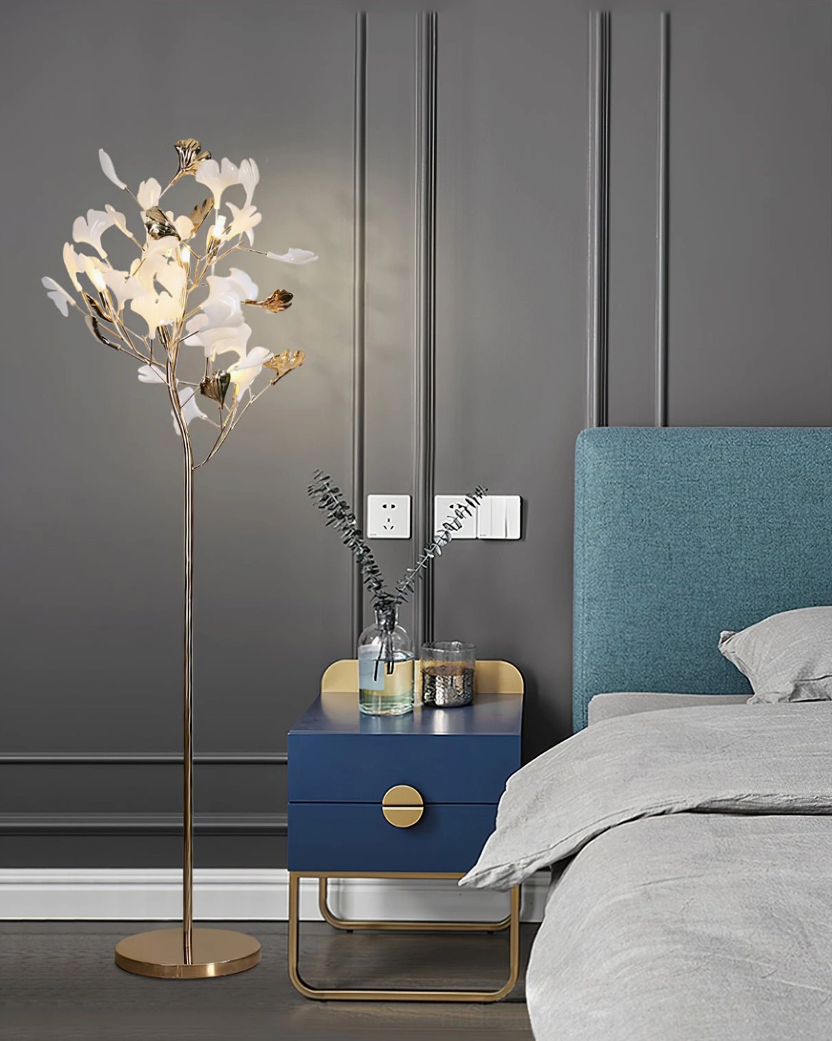 Ginkgo Leaf Floor Lamp in minimalist luxury bedroom beside navy nightstand, sculptural botanical lighting, mid-century modern aesthetic